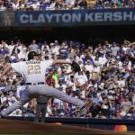 
              National League pitcher Clayton Kershaw, of the Los Angeles Dodgers, throws a pitch to the American League during the first inning of the MLB All-Star baseball game, Tuesday, July 19, 2022, in Los Angeles. (AP Photo/Mark J. Terrill)
            