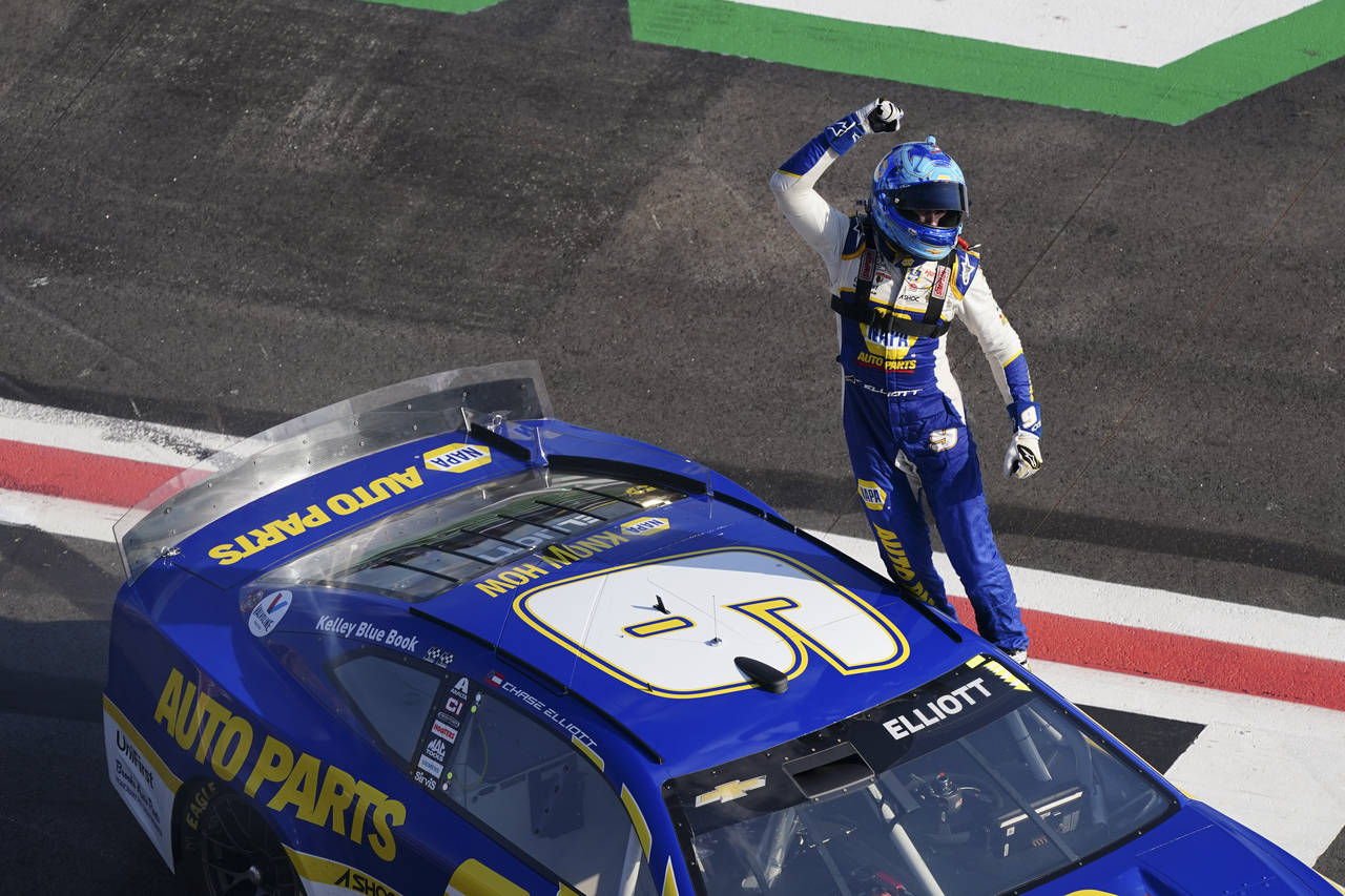 NASCAR Cup Series driver Chase Elliott (9) celebrates after winning a NASCAR Cup Series auto race a...