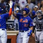 
              New York Mets' James McCann (33) celebrates with Jeff McNeil (1) after hitting a three-run home run against the Miami Marlins during the fourth inning of a baseball game Thursday, July 7, 2022, in New York. (AP Photo/Frank Franklin II)
            