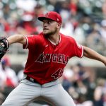 
              Los Angeles Angels' Reid Detmers pitches during the fifth inning of a baseball game against the Atlanta Braves, Sunday, July 24, 2022, in Atlanta. (AP Photo/Butch Dill)
            