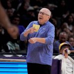
              Washington Mystics coach Mike Thibault gestures to an official during the first half of the team's WNBA basketball game against the Los Angeles Sparks on Tuesday, July 12, 2022, in Los Angeles. (Keith Birmingham/The Orange County Register via AP)
            