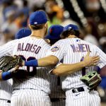 
              New York Mets' first baseman Pete Alonso and second baseman Jeff McNeil celebrate with teammates following their 8-5 victory against the San Diego Padres, Sunday, July 24, 2022, in New York. (AP Photo/Julia Nikhinson)
            