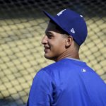 
              FILE - Los Angeles Dodgers prospect Diego Cartaya, of Venezuela, waits for batting practice before a baseball game against the San Diego Padres, in Los Angeles, Aug. 25, 2018. Cartaya is one of the minor leaguers in the Futures Game, where some of the best prospects in Major League Baseball will play a seven-inning matchup at Dodger Stadium, on Saturday, July 16, 2022. (AP Photo/Michael Owen Baker, File)
            
