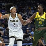 
              Chicago Sky's Candace Parker (3) looks to pass as Seattle Storm's Tina Charles defends during the first half of a WNBA basketball game Wednesday, July 20, 2022, in Chicago. (AP Photo/Charles Rex Arbogast)
            