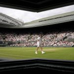 
              Britain's Cameron Norrie prepares to serve to Tommy Paul of the US during a men's fourth round singles match on day seven of the Wimbledon tennis championships in London, Sunday, July 3, 2022. (AP Photo/Alberto Pezzali)
            