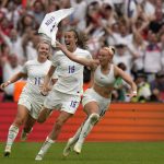 
              England's Chloe Kelly, right, celebrates after scoring her side's second goal during the Women's Euro 2022 final soccer match between England and Germany at Wembley stadium in London, Sunday, July 31, 2022. (AP Photo/Alessandra Tarantino)
            