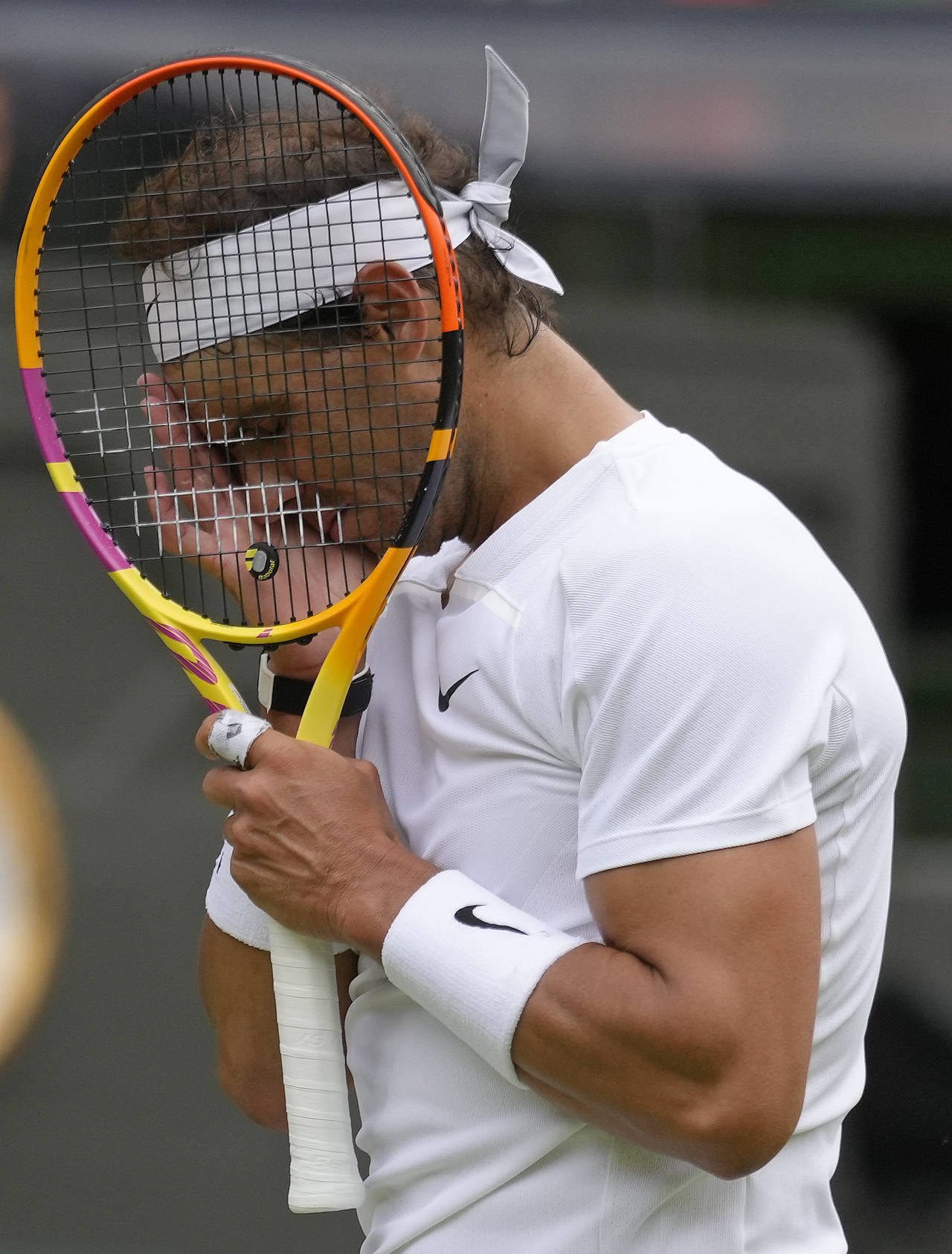 Spain's Rafael Nadal reacts after losing a point as he plays Taylor Fritz of the US in a men's sing...