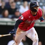 
              Cleveland Guardians' Andres Gimenez heads toward first on an RBI double against the Detroit Tigers during the third inning of a baseball game Thursday, July 14, 2022, in Cleveland. (AP Photo/David Dermer)
            