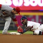 
              Atlanta Braves' Michael Harris steals second base past the tag of St. Louis Cardinals second baseman Nolan Gorman during the fourth inning of a baseball game Tuesday, July 5, 2022, in Atlanta. (Curtis Compton/Atlanta Journal-Constitution via AP)
            