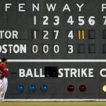 
              Boston Red Sox's Alex Verdugo looks at the scoreboard during the fifth inning of the team's baseball game against the Toronto Blue Jays, Friday, July 22, 2022, in Boston. (AP Photo/Michael Dwyer)
            
