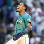 Julio Rodríguez of the Seattle Mariners scores a run Friday against the Toronto Blue Jays. (Photo by Steph Chambers/Getty Images)