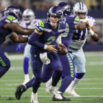 ARLINGTON, TX - AUGUST 26: Seattle Seahawks quarterback Drew Lock (2) looks to hand-off the football during the game between the Dallas Cowboys and the Seattle Seahawks on August 26, 2022 at AT&T Stadium in Arlington, Texas. (Photo by Matthew Pearce/Icon Sportswire via Getty Images)