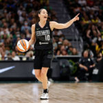 SEATTLE, WASHINGTON - AUGUST 07: Sue Bird #10 of the Seattle Storm looks on during the first quarter of her last regular season home game of her career against the Las Vegas Aces at Climate Pledge Arena on August 07, 2022 in Seattle, Washington. (Photo by Steph Chambers/Getty Images)