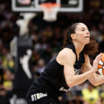 SEATTLE, WASHINGTON - AUGUST 07: Sue Bird #10 of the Seattle Storm shoots a three point basket during the first quarter of  her last regular season home game of her career against the Las Vegas Aces at Climate Pledge Arena on August 07, 2022 in Seattle, Washington. (Photo by Steph Chambers/Getty Images)