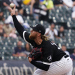 
              Chicago White Sox starting pitcher Michael Kopech throws against the Detroit Tigers during the first inning of a baseball game in Chicago, Friday, Aug. 12, 2022. (AP Photo/Nam Y. Huh)
            