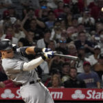 
              New York Yankees' Aaron Judge hits a three-run home run during the fourth inning of a baseball game against the Los Angeles Angels Tuesday, Aug. 30, 2022, in Anaheim, Calif. (AP Photo/Mark J. Terrill)
            