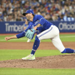 
              Toronto Blue Jays relief pitcher Adam Cimber throws to a Baltimore Orioles batter during the eighth inning of a baseball game Tuesday, Aug. 16, 2022, in Toronto. (Jon Blacker/The Canadian Press via AP)
            