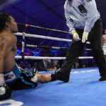 
              Teofimo Lopez knocks down Pedro Campa in a junior welterweight boxing match, Saturday, Aug. 13, 2022, in Las Vegas. (AP Photo/John Locher)
            