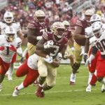 
              Florida State running back Trey Benson (3) fights for extra yardage as Duquesne defenders pursue in the second quarter of an NCAA college football game Saturday, Aug. 27, 2022, in Tallahassee, Fla. (AP Photo/Phil Sears)
            