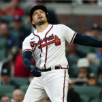 
              Atlanta Braves' Travis d'Arnaud reacts after striking out with the bases loaded during the first inning of the team's baseball game against the Colorado Rockies on Tuesday, Aug. 30, 2022, in Atlanta. (AP Photo/John Bazemore)
            