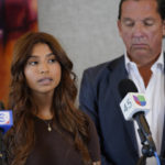 
              Ashley Solis, left, the first woman among several plaintiffs to file lawsuits accusing Cleveland Browns quarterback Deshaun Watson of sexual assault or harassment, speaks as her attorney Tony Buzbee stands beside her during a news conference to give an update to the lawsuits Thursday, Aug. 4, 2022, in Houston. The NFL is appealing a disciplinary officer's decision to suspend Watson for six games for violating the league's personal conduct policy. (AP Photo/David J. Phillip)
            