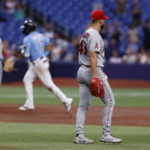 
              Los Angeles Angels starting pitcher Patrick Sandoval waits as Tampa Bay Rays' Isaac Paredes circles the bases after hitting a two-run home run during the third inning of a baseball game Thursday, Aug. 25, 2022, in St. Petersburg, Fla. (AP Photo/Scott Audette)
            