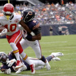 
              Kansas City Chiefs running back Isiah Pacheco is driven out of bounds near the goal line by Chicago Bears safety Jaquan Brisker in the first half of an NFL preseason football game Saturday, Aug. 13, 2022, in Chicago. (AP Photo/David Banks)
            