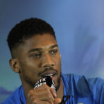 
              Britain's Anthony Joshua speaks during a press conference in Jeddah, Saudi Arabia, Wednesday, Aug. 17, 2022. Joshua is due to fight defending champion Ukraine's Oleksandr Usyk in a heavyweight boxing rematch in Jeddah on Aug. 20. (AP Photo/Hassan Ammar)
            
