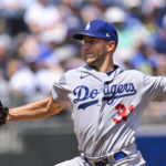 
              Los Angeles Dodgers starting pitcher Tyler Anderson throws to a Kansas City Royals batter during the first inning of a baseball game, Sunday, Aug. 14, 2022, in Kansas City, Mo. (AP Photo/Reed Hoffmann)
            