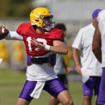 
              LSU quarterback Garrett Nussmeier (13) passes during their NCAA college football practice in Baton Rouge, La., Monday, Aug. 15, 2022. LSU quarterback Myles Brennan announced Monday that he has decided to end his college football career after five seasons with the Tigers. (AP Photo/Gerald Herbert)
            