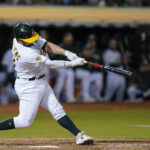 
              Oakland Athletics' Shea Langeliers hits a solo home run against the New York Yankees during the sixth inning of a baseball game in Oakland, Calif., Thursday, Aug. 25, 2022. (AP Photo/Godofredo A. Vásquez)
            