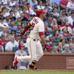 
              St. Louis Cardinals' Nolan Arenado follows through on an RBI single during the first inning of a baseball game against the New York Yankees Saturday, Aug. 6, 2022, in St. Louis. (AP Photo/Jeff Roberson)
            