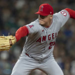 
              Los Angeles Angels reliever Aaron Loup throws during the sixth inning of the team's baseball game against the Seattle Mariners, Friday, Aug. 5, 2022, in Seattle. (AP Photo/Stephen Brashear)
            