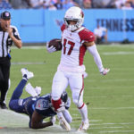 
              Arizona Cardinals wide receiver Andy Isabella (17) does out of bounds a he is chased by Tennessee Titans safety Theo Jackson (29) in the first half of a preseason NFL football game Saturday, Aug. 27, 2022, in Nashville, Tenn. (AP Photo/Mark Zaleski)
            