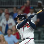 
              Atlanta Braves Travis d'Arnaud hits a walk off single in the eleventh inning of a baseball game against the Houston Astros Saturday, Aug. 20, 2022, in Atlanta. (AP Photo/Hakim Wright Sr.)
            