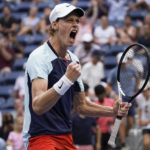 
              Jannik Sinner, of Italy, reacts after defeating Daniel Altmaier, of Germany, during the first round of the US Open tennis championships, Tuesday, Aug. 30, 2022, in New York. (AP Photo/John Minchillo)
            