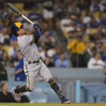 
              Milwaukee Brewers' Luis Urias (2) hits a home run during the fourth inning of a baseball game against the Los Angeles Dodgers in Los Angeles, Monday, Aug. 22, 2022. (AP Photo/Ashley Landis)
            
