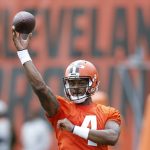 
              FILE - Cleveland Browns quarterback Deshaun Watson throws a pass during an NFL football practice at the team's training facility, May 25, 2022, in Berea, Ohio. The NFL suspended Watson for six games on Monday, Aug. 1, 2022 for violating its personal conduct policy following accusations of sexual misconduct made against him by two dozen women in Texas, two people familiar with the decision said. (AP Photo/Ron Schwane, File)
            