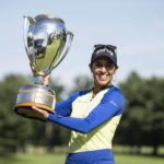 
              Paula Reto, of South Africa, holds the trophy after winning the the Canadian Pacific Women's Open golf tournament in Ottawa, on Sunday, Aug. 28, 2022. (Justin Tang/The Canadian Press via AP)
            