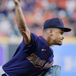 
              Minnesota Twins starting pitcher Chris Archer throws against the Houston Astros during the first inning of a baseball game Thursday, Aug. 25, 2022, in Houston. (AP Photo/Michael Wyke)
            