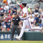 
              Atlanta Braves' Matt Olson gestures while running bases after hitting a two-run home run in the first inning of a baseball game against the Houston Astros, Sunday, Aug. 21, 2022, in Atlanta. (AP Photo/Hakim Wright Sr.)
            