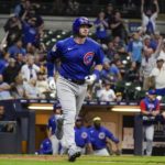 
              Chicago Cubs' Ian Happ hits a two-run home run during the 10th inning of a baseball game against the Milwaukee Brewers Friday, Aug. 26, 2022, in Milwaukee. (AP Photo/Morry Gash)
            