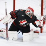 
              Canada goalie Dylan Garand makes a save during third-period IIHF world junior hockey championship gold medal game action against Finland in Edmonton, Alberta, Saturday, Aug. 20, 2022. (Jeff McIntosh/The Canadian Press via AP)
            