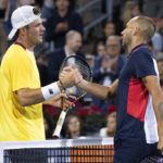 
              Tommy Paul, left, of the Unites States congratulates Daniel Evans, of Britain, on his victory during the National Bank Open tennis tournament Friday, Aug. 12, 2022, in Montreal. (Paul Chiasson/The Canadian Press via AP)
            