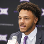 
              FILE - Kansas State quarterback Adrian Martinez speaks to reporters during the NCAA college football Big 12 Media Days in Arlington, Texas, Wednesday, July 13, 2022. “For me, it’s been nothing more than fun,” said Martinez, the prolific former Nebraska quarterback who will start for the Wildcats this season. “I’ve never wanted it to stress me out.” The additional stress is why some players have opted out of NIL deals. (AP Photo/LM Otero, File)
            