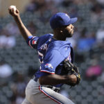 
              Texas Rangers relief pitcher Taylor Hearn throws during the ninth inning of a baseball game against the Minnesota Twins, Sunday, Aug. 21, 2022, in Minneapolis. (AP Photo/Stacy Bengs)
            