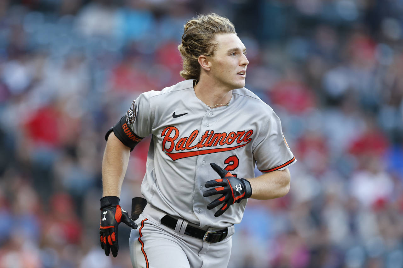 Baltimore Orioles' Gunnar Henderson watches his solo home run off of Cleveland Guardians starting p...