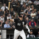
              Chicago White Sox's Gavin Sheets watches his three-run home run off Kansas City Royals starting pitcher Brady Singer during the fifth inning of a baseball game Tuesday, Aug. 30, 2022, in Chicago. (AP Photo/Charles Rex Arbogast)
            