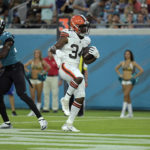 
              Cleveland Browns running back Jerome Ford (34) scores a touchdown against the Jacksonville Jaguars during the first half of an NFL preseason football game, Friday, Aug. 12, 2022, in Jacksonville, Fla. (AP Photo/Phelan M. Ebenhack)
            