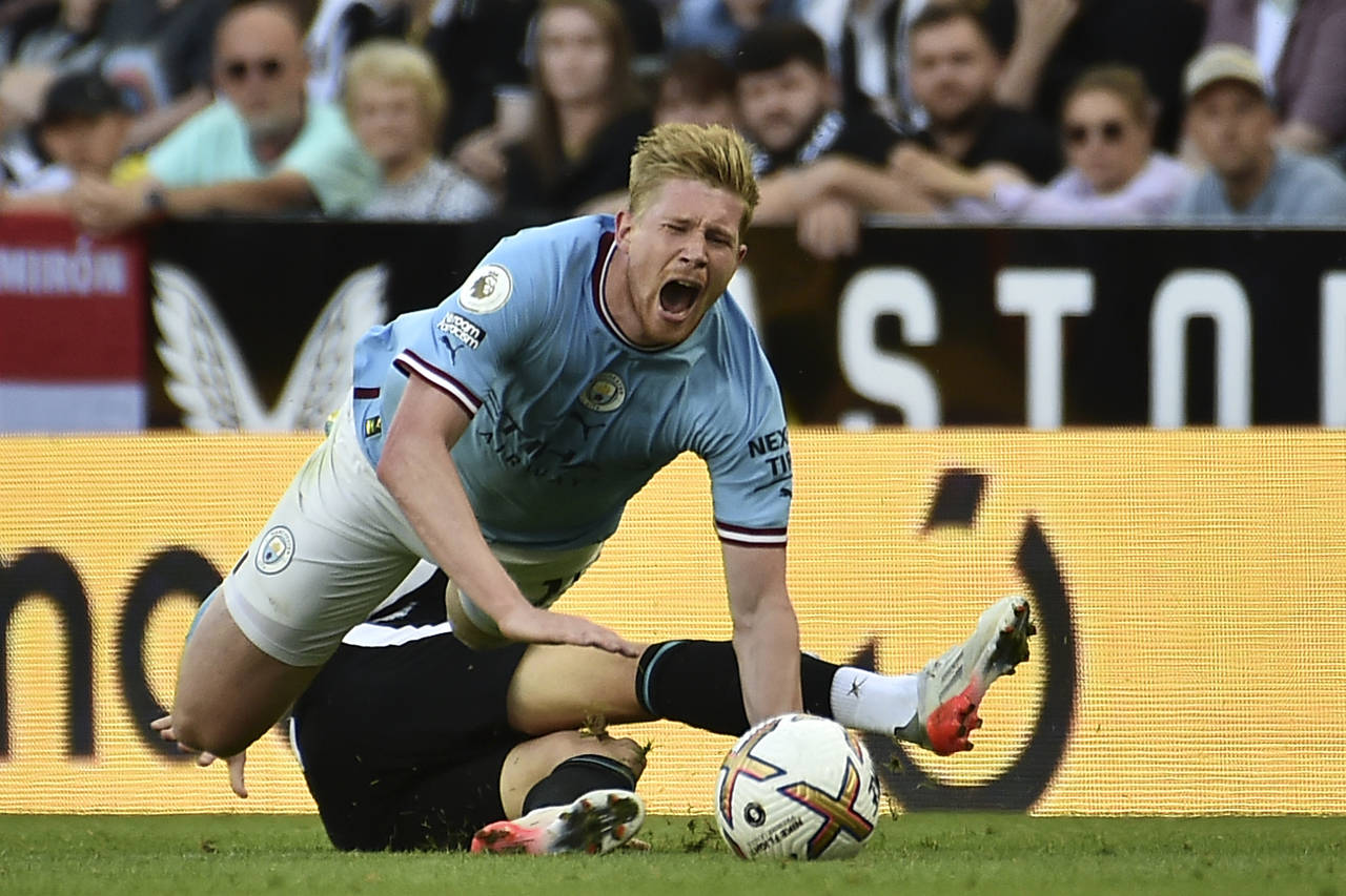 Newcastle's Kieran Trippier fouls Manchester City's Kevin De Bruyne during the English Premier Leag...